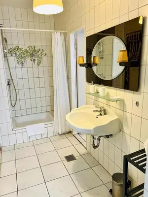 Ein Badezimmer in der Unterkunft Hotel Nest