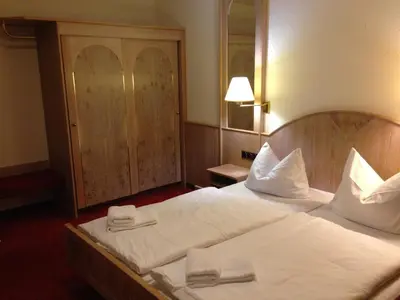 Ein Bett oder Betten in einem Zimmer der Unterkunft Hotel 