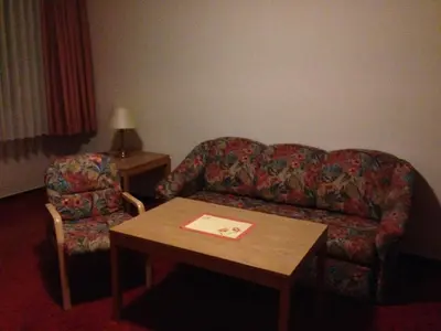 Ein Sitzbereich in der Unterkunft Hotel 