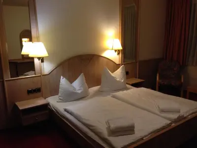 Ein Bett oder Betten in einem Zimmer der Unterkunft Hotel 
