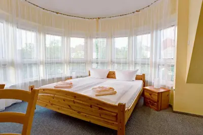 Ein Bett oder Betten in einem Zimmer der Unterkunft Hotel Atlantic