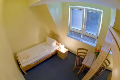 Ein Bett oder Betten in einem Zimmer der Unterkunft Hotel Atlantic