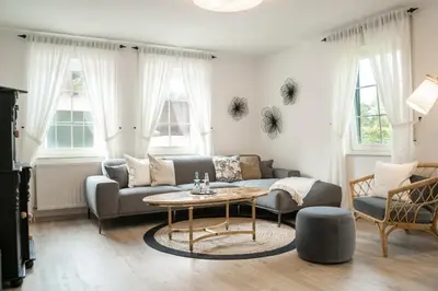 Ein Sitzbereich in der Unterkunft Hotel & Restaurant Am Alten Rhin