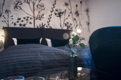 Ein Bett oder Betten in einem Zimmer der Unterkunft Hotel & Restaurant Am Alten Rhin