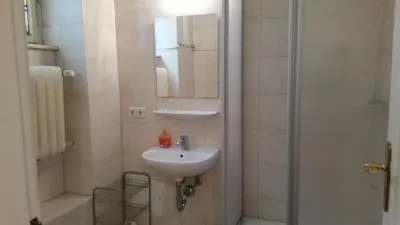Ein Badezimmer in der Unterkunft Hotel Pension Kima