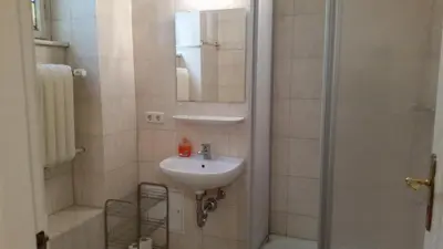 Ein Badezimmer in der Unterkunft Hotel Pension Kima