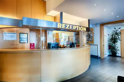 Lobby/Rezeption in der Unterkunft Enjoy Hotel am Studio