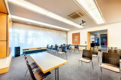 Ein Sitzbereich in der Unterkunft Enjoy Hotel am Studio