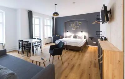 Ein Bett oder Betten in einem Zimmer der Unterkunft Old Town Apartments
