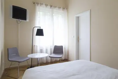 Ein Bett oder Betten in einem Zimmer der Unterkunft Hotel Residenz Begaswinkel
