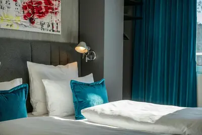 Ein Bett oder Betten in einem Zimmer der Unterkunft Motel One Berlin Mitte