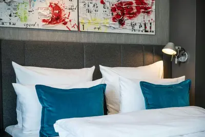 Ein Bett oder Betten in einem Zimmer der Unterkunft Motel One Berlin Mitte