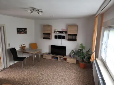 Ein Sitzbereich in der Unterkunft Ferienwohnung Lux