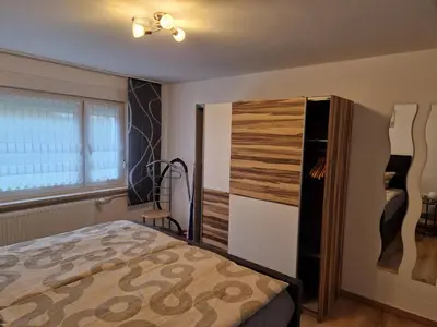 Ein Bett oder Betten in einem Zimmer der Unterkunft Ferienwohnung Lux