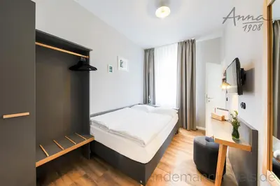 Ein Bett oder Betten in einem Zimmer der Unterkunft Anna 1908