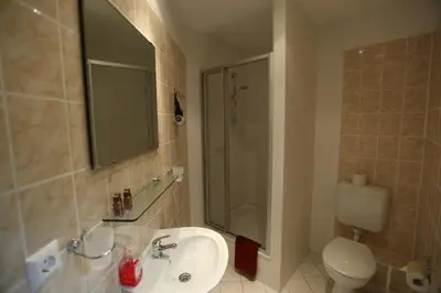 Ein Badezimmer in der Unterkunft Hotel AI Königshof