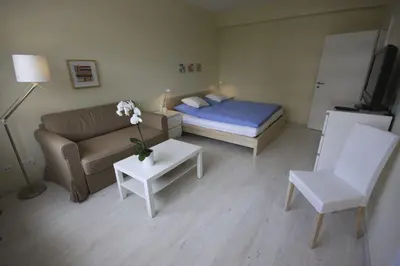 Ein Bett oder Betten in einem Zimmer der Unterkunft City Lodging Apartments