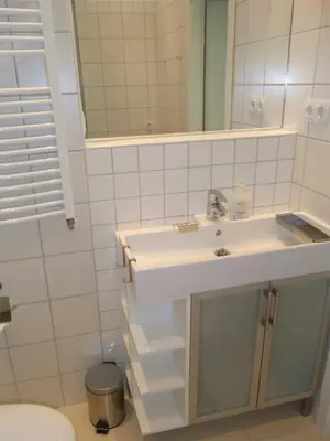 Ein Badezimmer in der Unterkunft City Lodging Apartments