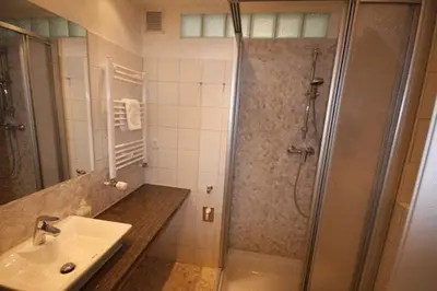 Ein Badezimmer in der Unterkunft City Lodging Apartments