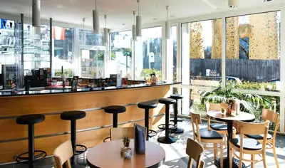 Ein Restaurant oder anderes Speiselokal in der Unterkunft Familienhotel Citylight