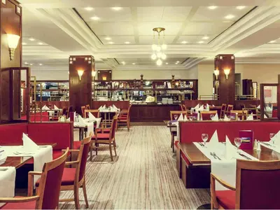 Ein Restaurant oder anderes Speiselokal in der Unterkunft Mercure Hotel Potsdam City
