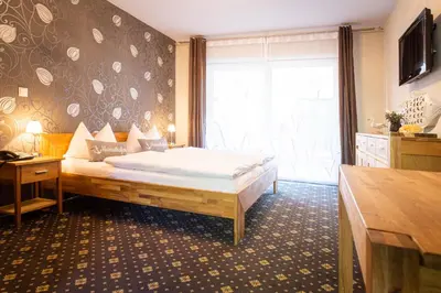Ein Bett oder Betten in einem Zimmer der Unterkunft Fischhaus Wendisch Rietz
