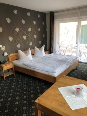 Ein Bett oder Betten in einem Zimmer der Unterkunft Fischhaus Wendisch Rietz