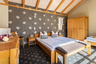 Ein Bett oder Betten in einem Zimmer der Unterkunft Fischhaus Wendisch Rietz