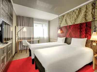 Ein Bett oder Betten in einem Zimmer der Unterkunft ibis Berlin Mitte