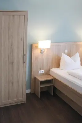 Ein Bett oder Betten in einem Zimmer der Unterkunft Businesshotel Berlin