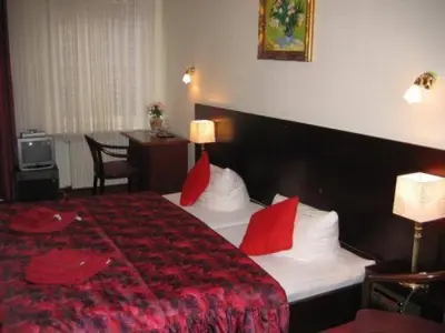 Ein Bett oder Betten in einem Zimmer der Unterkunft Hotel Novalis