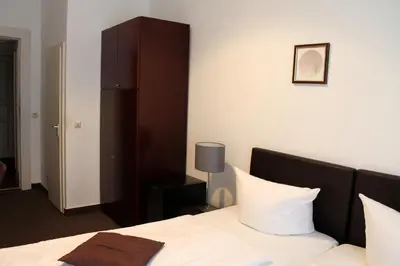Ein Bett oder Betten in einem Zimmer der Unterkunft Hotel Novalis