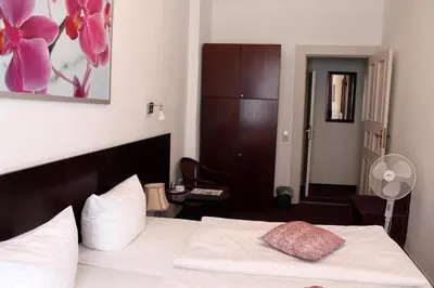 Ein Bett oder Betten in einem Zimmer der Unterkunft Hotel Novalis