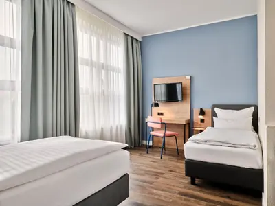 Ein Bett oder Betten in einem Zimmer der Unterkunft Garner Hotel Berlin - Schöneberg by IHG
