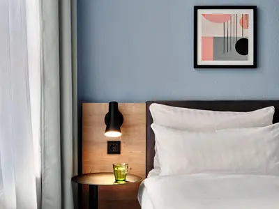 Ein Bett oder Betten in einem Zimmer der Unterkunft Garner Hotel Berlin - Schöneberg by IHG