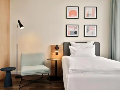 Ein Bett oder Betten in einem Zimmer der Unterkunft Garner Hotel Berlin - Schöneberg by IHG