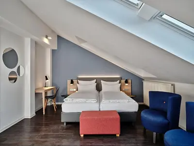 Ein Bett oder Betten in einem Zimmer der Unterkunft Garner Hotel Berlin - Schöneberg by IHG
