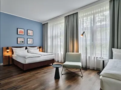 Ein Bett oder Betten in einem Zimmer der Unterkunft Garner Hotel Berlin - Schöneberg by IHG
