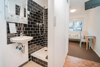 Ein Badezimmer in der Unterkunft Motel Home Berlin