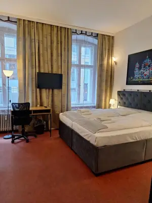 Ein Bett oder Betten in einem Zimmer der Unterkunft Hotel Amelie Berlin