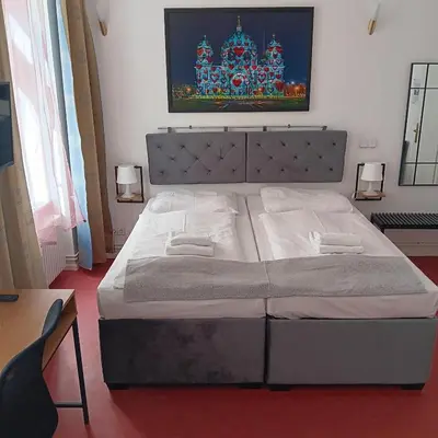 Ein Bett oder Betten in einem Zimmer der Unterkunft Hotel Amelie Berlin