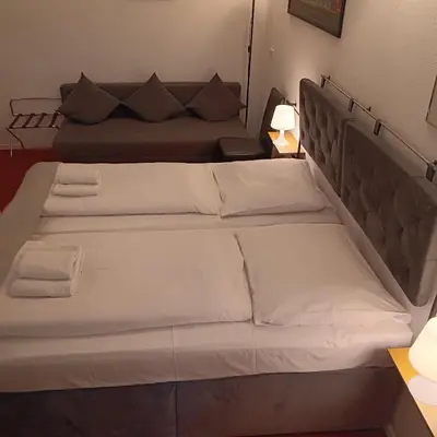 Ein Bett oder Betten in einem Zimmer der Unterkunft Hotel Amelie Berlin