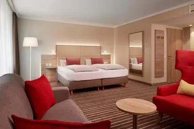 Ein Bett oder Betten in einem Zimmer der Unterkunft HYPERION Hotel Berlin