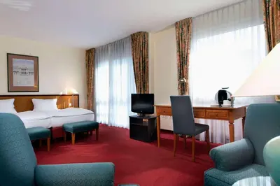 Ein Bett oder Betten in einem Zimmer der Unterkunft Wyndham Garden Hennigsdorf Berlin
