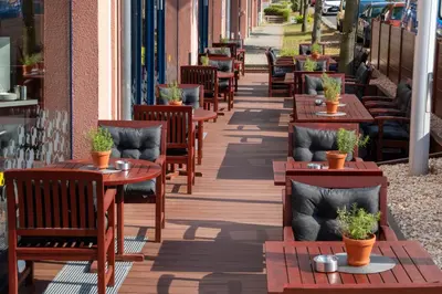 Ein Restaurant oder anderes Speiselokal in der Unterkunft Best Western Premier Airporthotel Berlin