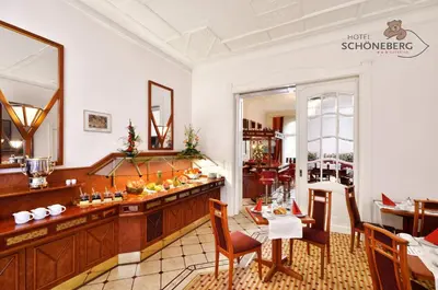 Ein Sitzbereich in der Unterkunft Hotel Schöneberg