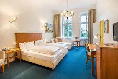 Ein Bett oder Betten in einem Zimmer der Unterkunft Hotel Brandies Berlin GmbH