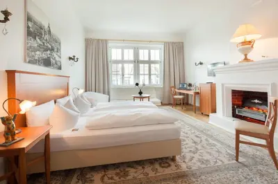 Ein Bett oder Betten in einem Zimmer der Unterkunft Hotel Brandies Berlin GmbH