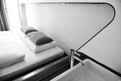 Ein Bett oder Betten in einem Zimmer der Unterkunft Hotel Q! Berlin