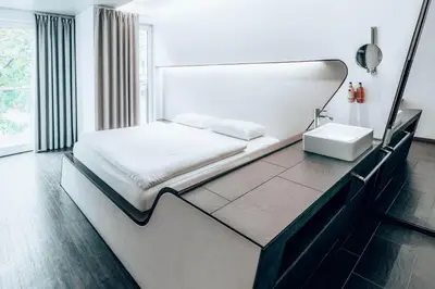 Ein Bett oder Betten in einem Zimmer der Unterkunft Hotel Q! Berlin
